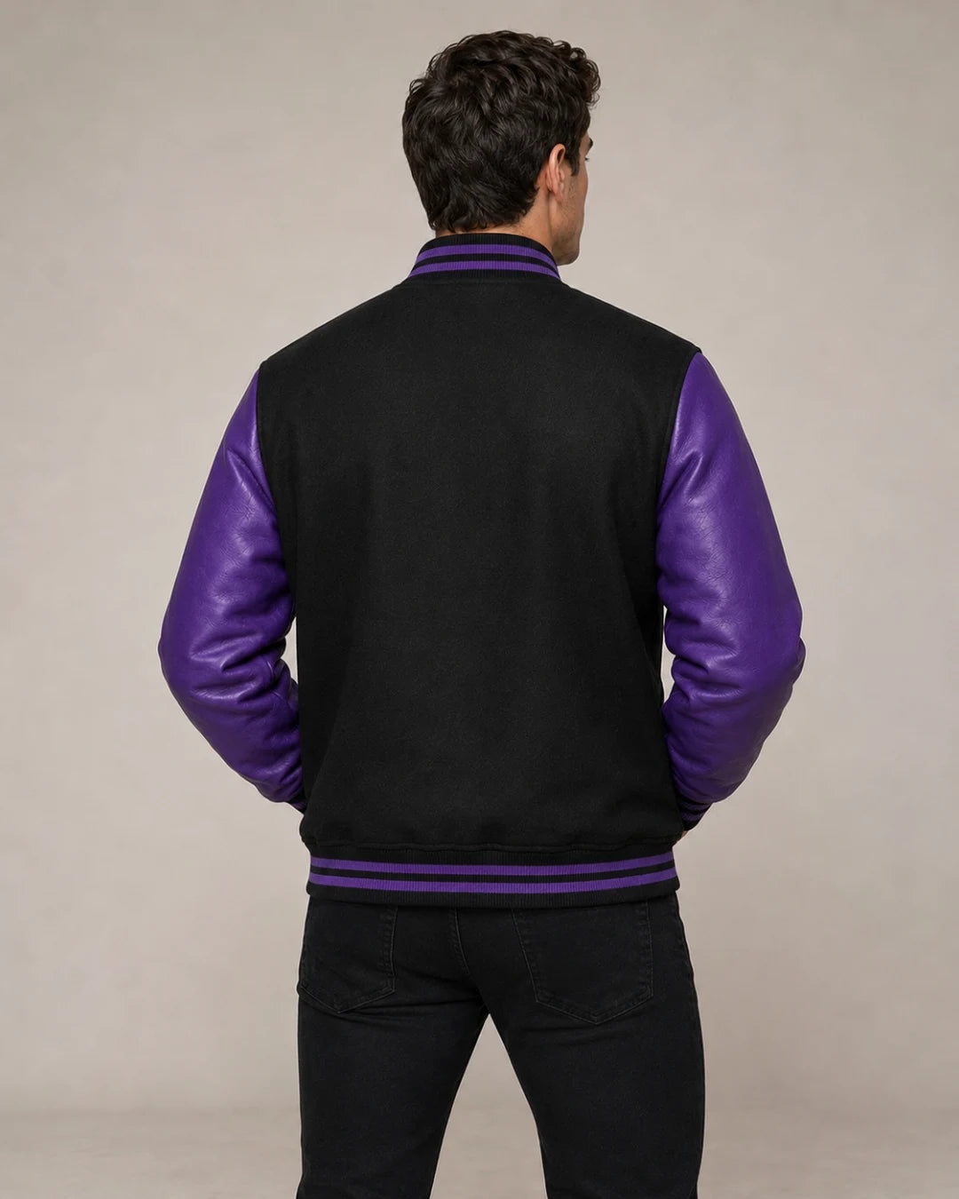 Men’s black and purple wool and leather varsity jacket back view