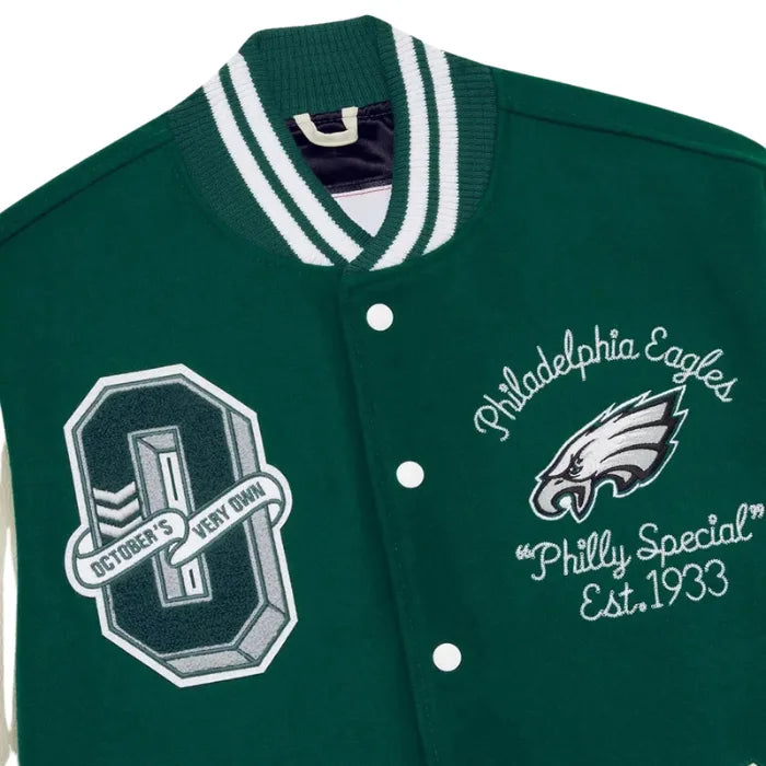 Green letterman jacket with Philadelphia Eagles logo and text on a white background