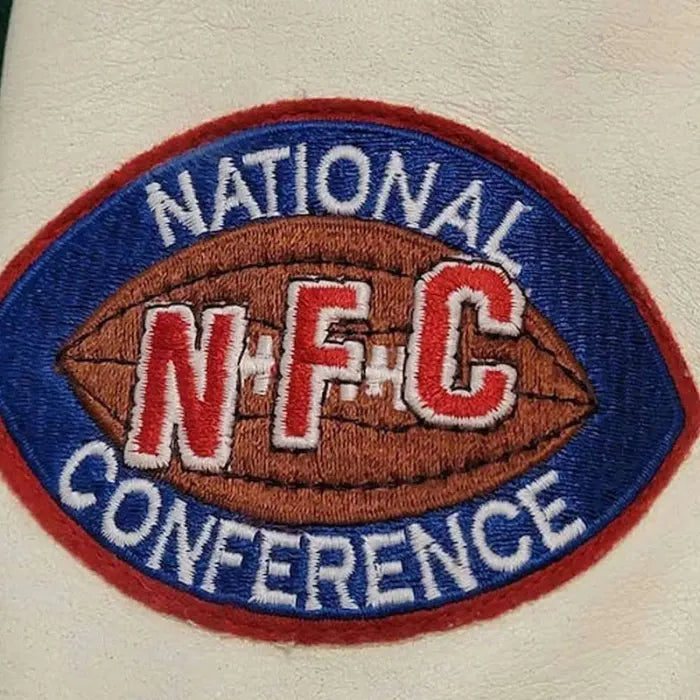 Embroidered patch of the National Football Conference (NFC) on a sports jersey.
