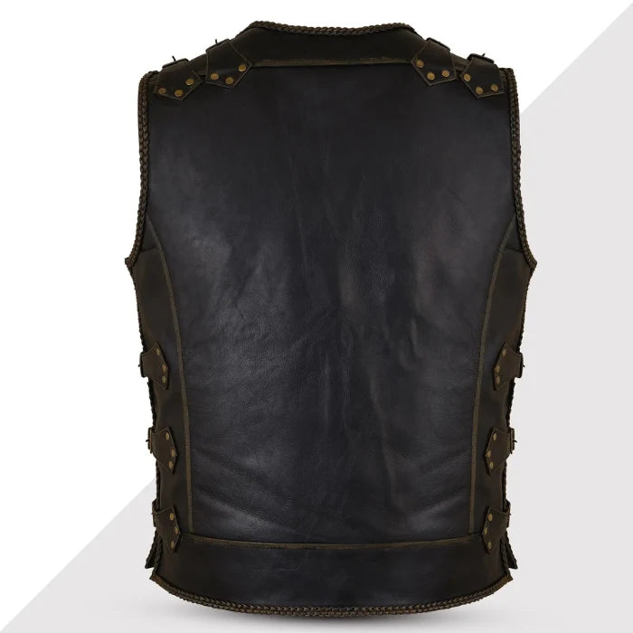 Black leather vest with decorative studs on a white background