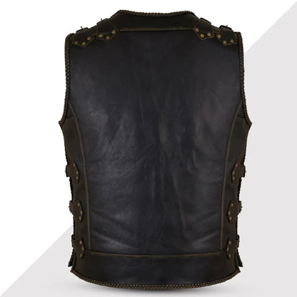 Black leather vest with decorative studs on a white background