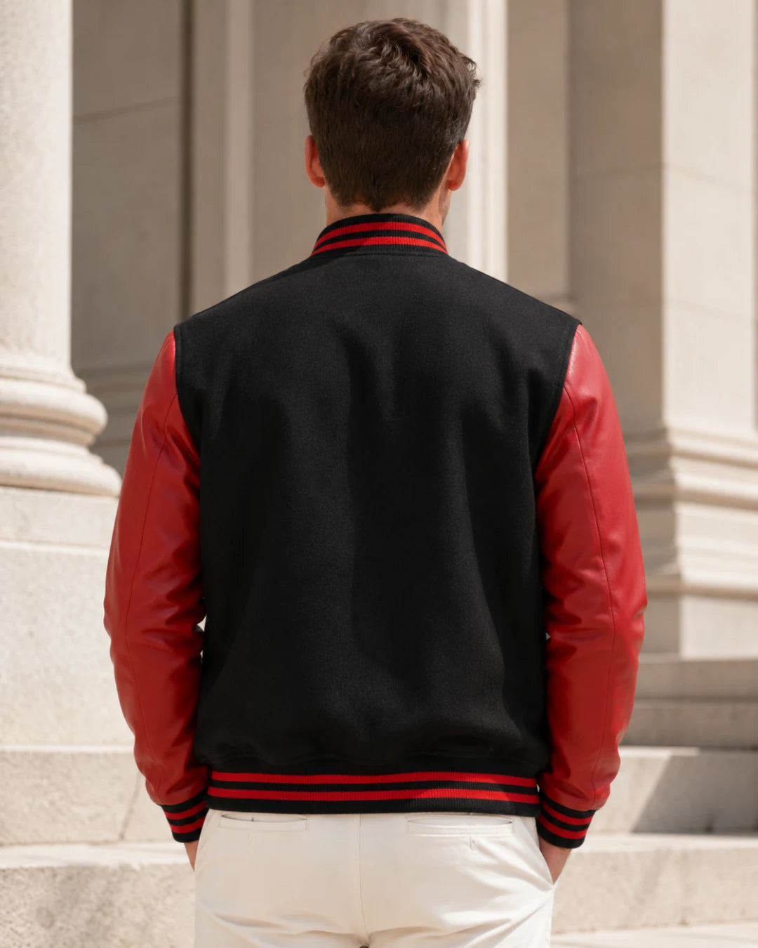 Men’s black and red wool and leather varsity jacket back view