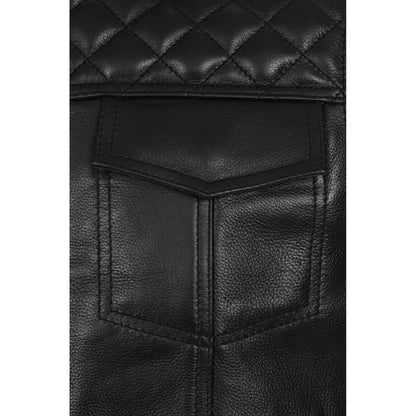 Close-up of a black leather vest with quilted pattern