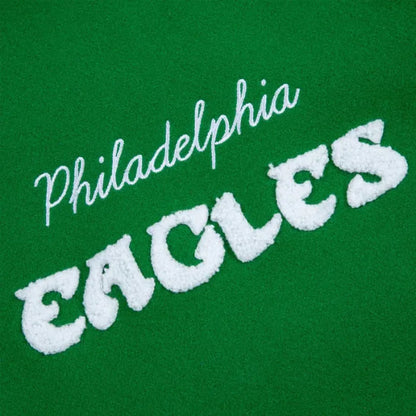 Embroidered 'Philadelphia Eagles' text on a green background