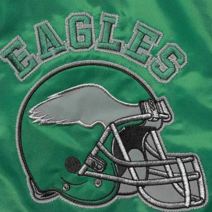 Embroidered Eagles logo on a green background
