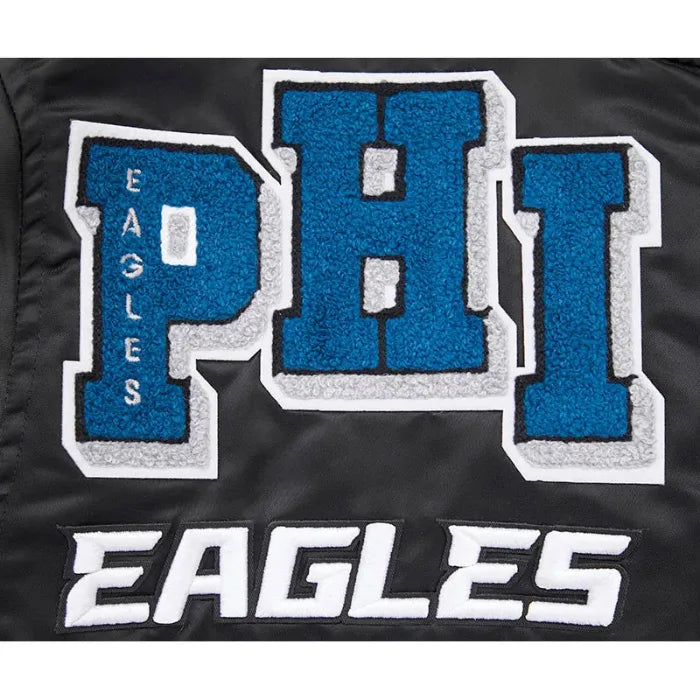 Black jacket with 'PHI Eagles' embroidered on it