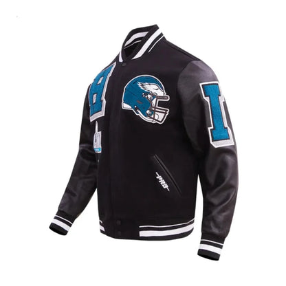Black varsity jacket with sports team logo on a white background