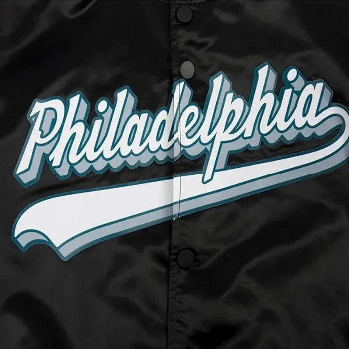 Black jacket with 'Philadelphia' text in white and blue on a dark background