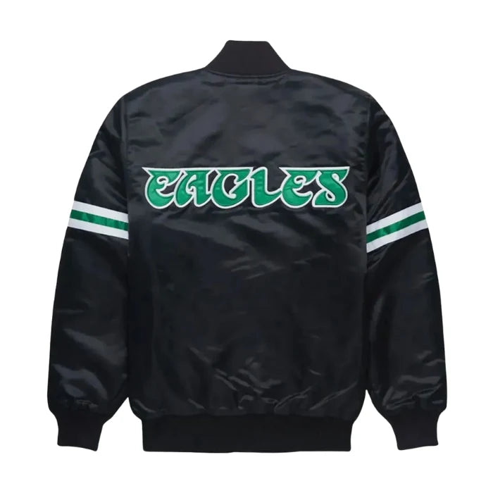 Black satin jacket with 'EAGLES' text on a white background