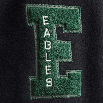 Green 'EAGLES' patch on a black background